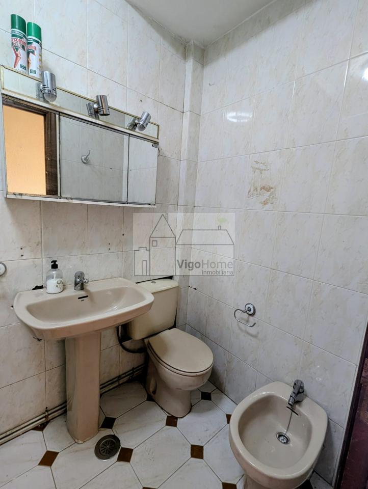 CUARTO DE BAÑO BAJO VIVIENDA